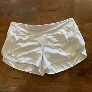 White size 12 lululemon shorts.